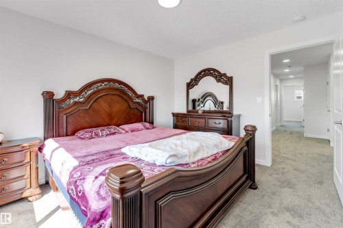 Neutral wall tones, recessed ceiling lighting, and gray carpet flooring - 788 Mattson Drive, Edmonton, AB 