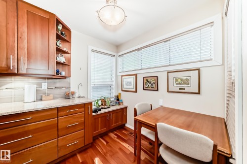 adjacent breakfast nook - 7930 111 Street, Edmonton, AB - Indoor Photo Showing Other Room