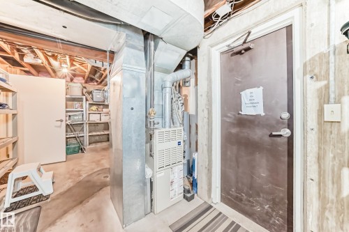 Door access to Parkade -- THREE TITLED STALLS #36,#72,#94 - 7930 111 Street, Edmonton, AB - Indoor Photo Showing Basement