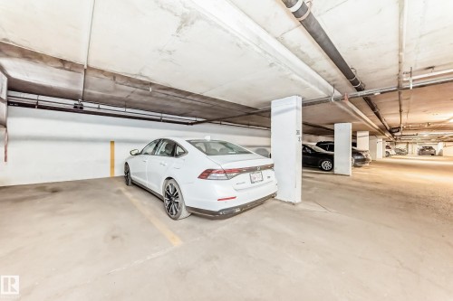 #36 SINGLE TITLED STALL INCLUDED.  Three total spaces titled. - 7930 111 Street, Edmonton, AB - Indoor Photo Showing Garage