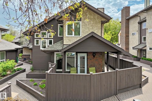 Exterior facade featuring a combination of stucco and horizontal siding - 7930 111 Street, Edmonton, AB - Outdoor With Exterior