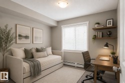 Versatile room featuring a window with white blinds, neutral wall tones, and overhead lighting - 