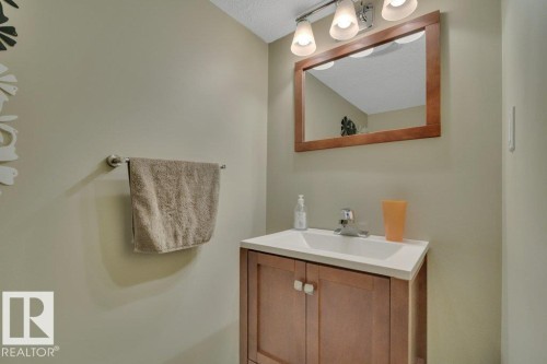 Basement - 2 piece powder room - 6042 214 Street, Edmonton, AB - Indoor Photo Showing Bathroom