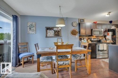 Lovely Dining Area with access to the deck through sliding doors - 6042 214 Street, Edmonton, AB - Indoor Photo Showing Dining Room
