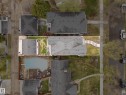 Property outline featuring a main residence with a detached structure - 6115 111 Avenue, Edmonton, AB  -  With View 