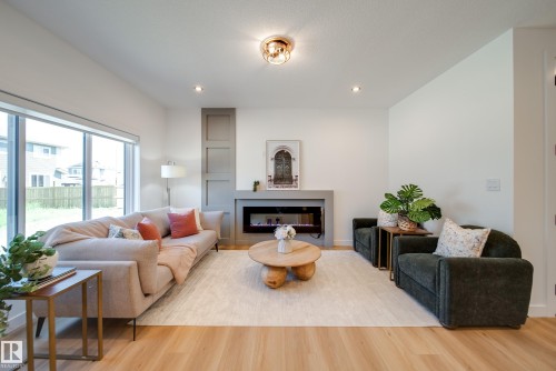 6 Blackbird Bend, Fort Saskatchewan, AB - Indoor Photo Showing Living Room With Fireplace