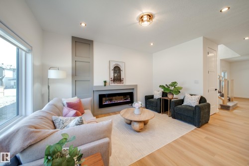 6 Blackbird Bend, Fort Saskatchewan, AB - Indoor Photo Showing Living Room With Fireplace