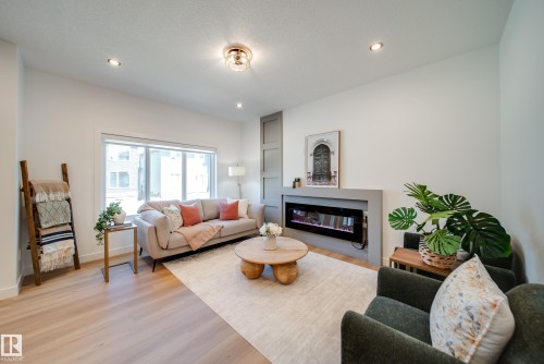 6 Blackbird Bend, Fort Saskatchewan, AB - Indoor Photo Showing Living Room With Fireplace