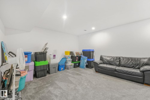 Carpeted room with recessed lighting and a neutral color palette - 556 Merlin Landing Landing, Edmonton, AB 