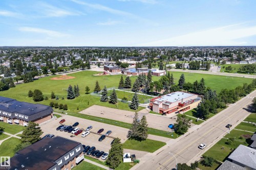 Aerial perspective showcasing a residential neighborhood with ample green space - 14128 73 Street, Edmonton, AB 