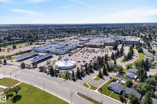 Aerial perspective showcasing a large commercial complex with extensive parking areas - 14128 73 Street, Edmonton, AB 