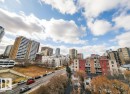 Urban skyline featuring diverse architectural styles and mature trees - 603 9707 105 Street, Edmonton, AB  - Outdoor With View 