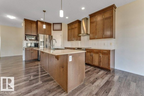 1224 25 Avenue, Edmonton, AB - Indoor Photo Showing Kitchen With Stainless Steel Kitchen With Upgraded Kitchen