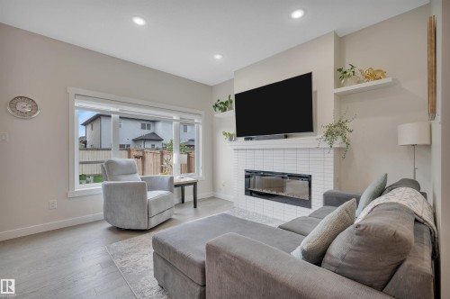 20709 99A Avenue, Edmonton, AB - Indoor Photo Showing Living Room With Fireplace