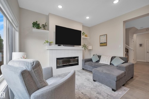 20709 99A Avenue, Edmonton, AB - Indoor Photo Showing Living Room With Fireplace