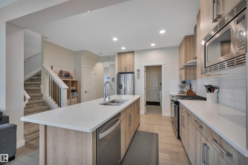 20709 99A Avenue, Edmonton, AB - Indoor Photo Showing Kitchen With Double Sink