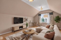 Vaulted ceiling room featuring hardwood flooring and a window with patterned drapes - 