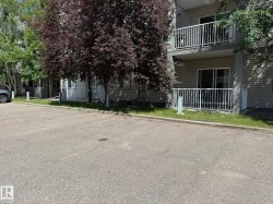 PHOTO OF YOUR #278 PARKING STALL...JUST OUTSIDE TO THE LEFT OF THE BACK DOOR ENTRANCE! AND BELOW YOUR UNIT #205! - 