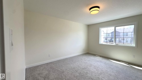 115 Ficus Way, Fort Saskatchewan, AB - Indoor Photo Showing Other Room