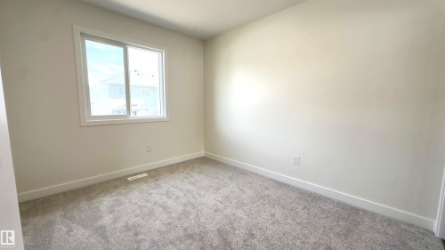 115 Ficus Way, Fort Saskatchewan, AB - Indoor Photo Showing Other Room