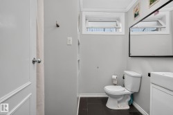 Bathroom featuring dual awning windows - 
