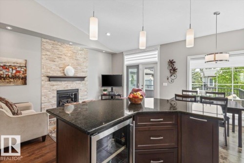 33 88 Lacombe Drive, St. Albert, AB - Indoor Photo Showing Kitchen With Fireplace