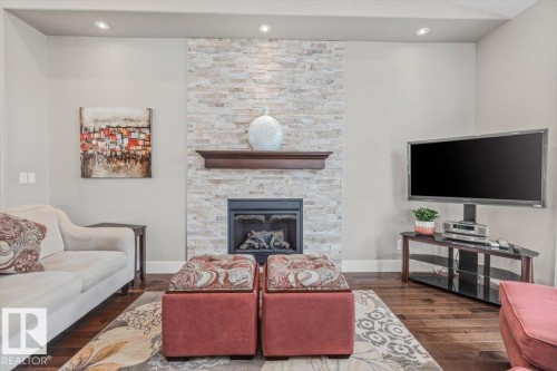 33 88 Lacombe Drive, St. Albert, AB - Indoor Photo Showing Living Room With Fireplace