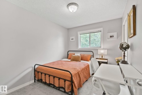 Carpeted room with light grey walls - 5161 54 Avenue, Redwater, AB - Indoor Photo Showing Bedroom