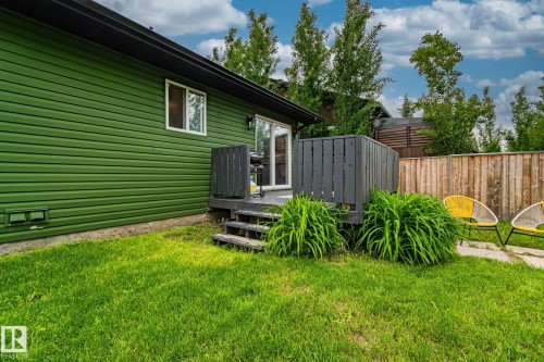 Expansive green lawn providing outdoor space - 5161 54 Avenue, Redwater, AB - Outdoor