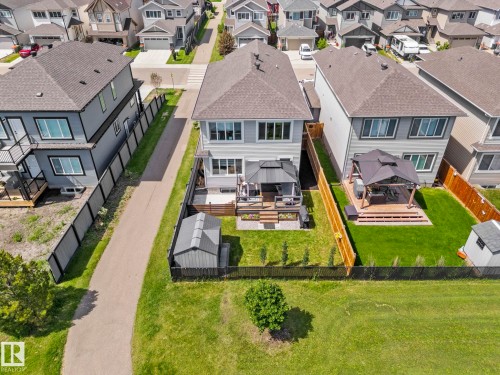 Two-story residence with a gray exterior and dark roof shingles - 1931 Westerra Lane, Stony Plain, AB 