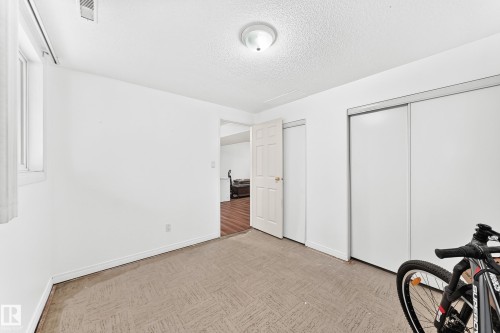 Room featuring light-toned carpeting and white walls - 191 Ridgewood Terrace, St. Albert, AB 