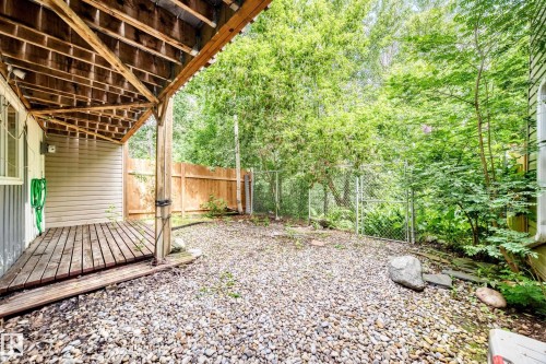 Covered wood deck with exposed rafter ceiling - 191 Ridgewood Terrace, St. Albert, AB 
