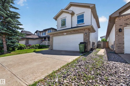 Two-story detached residence featuring a stone and siding exterior - 547 Leger Way, Edmonton, AB 