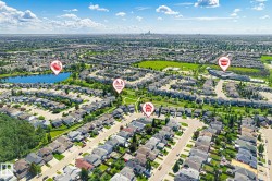 Aerial view of a residential neighborhood with varied architectural styles - 