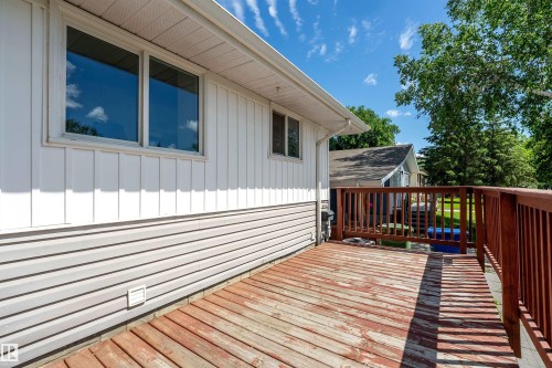 Exterior wood deck with railings - 5516 47A Avenue, Wetaskiwin, AB - Outdoor With Deck Patio Veranda With Exterior