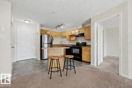 Certain photos have been virtually staged for illustrative purposes only. The home is currently vacant, and the furniture and accessories shown have been digitally added. - 201 3425 19 Street Nw, Edmonton, AB 