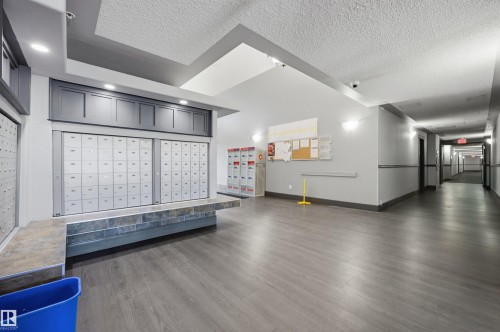 South entryway featuring wall-mounted mailboxes - 201 3425 19 Street Nw, Edmonton, AB 