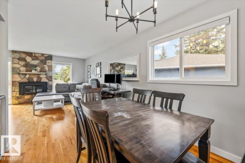 8523 143 Street, Edmonton, AB - Indoor Photo Showing Dining Room With Fireplace