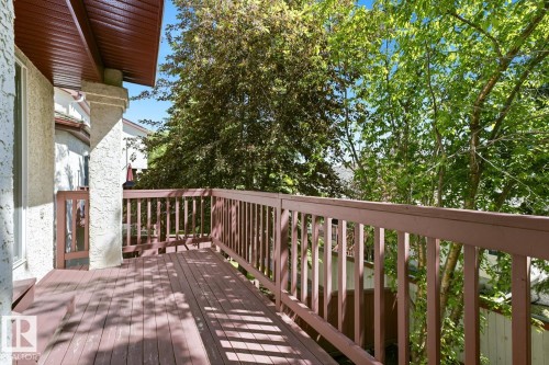 Spacious exterior deck with wood-finish flooring and matching railings - 6 1237 Carter Crest Road, Edmonton, AB 