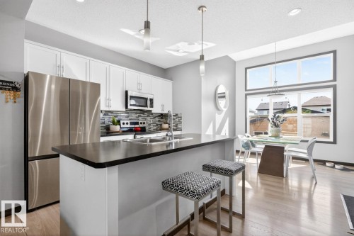 17575 59 Street, Edmonton, AB - Indoor Photo Showing Kitchen With Stainless Steel Kitchen With Double Sink With Upgraded Kitchen