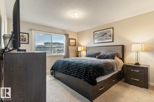 Carpeted bedroom with neutral wall tones - 12737 205 Street Nw, Edmonton, AB 