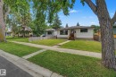 Single-story property with white siding and brown trim - 9545 65 Avenue, Edmonton, AB 