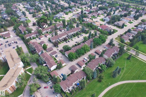 Aerial perspective showcasing a residential community with mature landscaping - 173 Tudor Lane, Edmonton, AB 