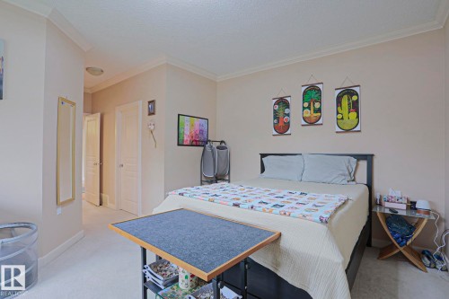 Neutral-toned walls complement plush carpeting throughout this space - 13 7293 South Terwillegar Drive, Edmonton, AB 