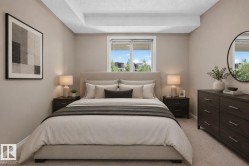 Carpeted bedroom with neutral wall tones and a window featuring white blinds - 