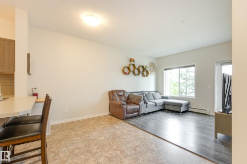 120 1820 Rutherford Road, Edmonton, AB - Indoor Photo Showing Living Room