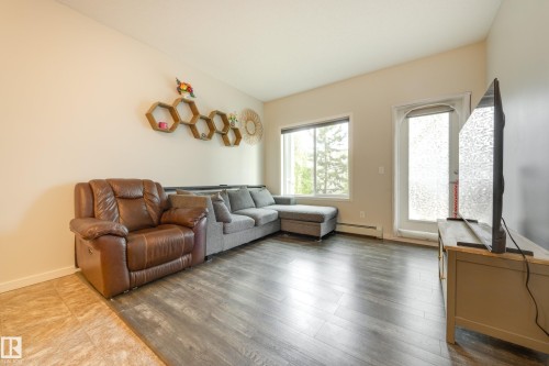 120 1820 Rutherford Road, Edmonton, AB - Indoor Photo Showing Living Room