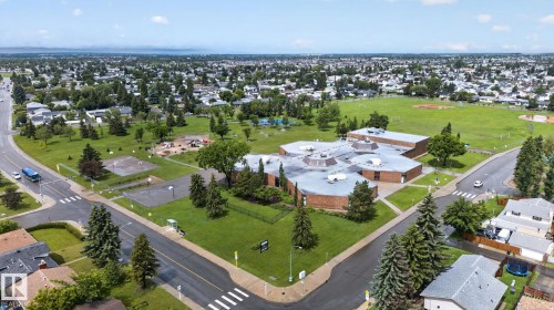 Aerial perspective showcasing a sprawling park with extensive green spaces - 7539 149A Avenue, Edmonton, AB 