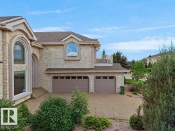 Stone veneer exterior with arched window accents - 