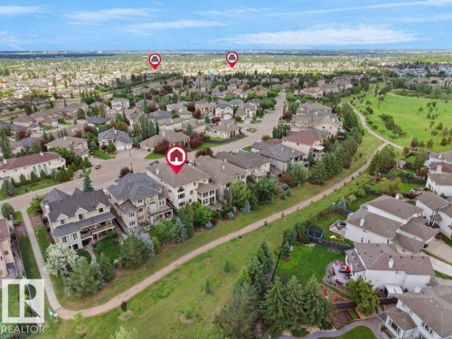 Aerial perspective of a developed residential area featuring numerous detached properties - 2423 Tegler Green, Edmonton, AB 